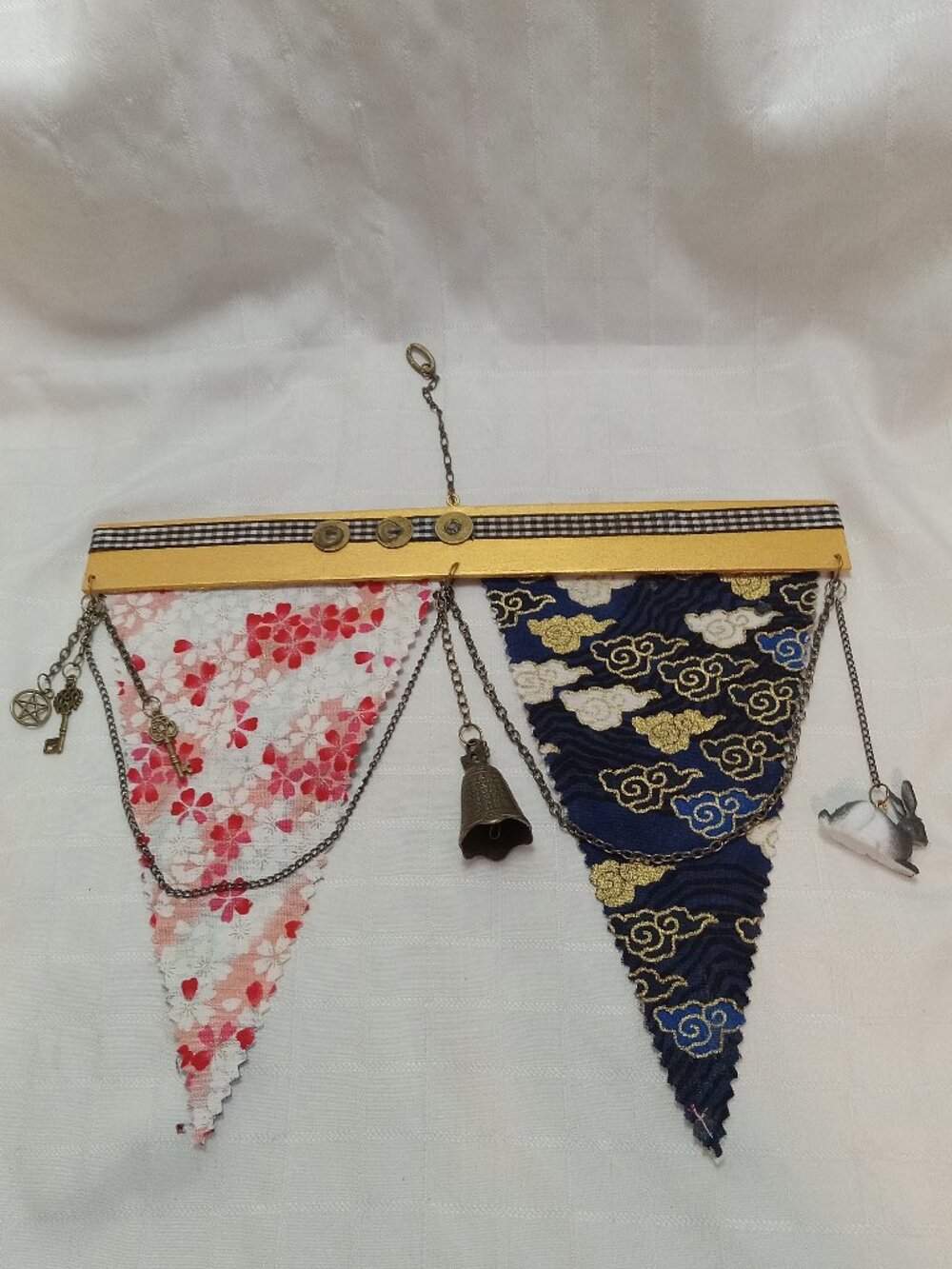 2-A reversible, handmade hanging banner made with fabric, chains, charms & coins